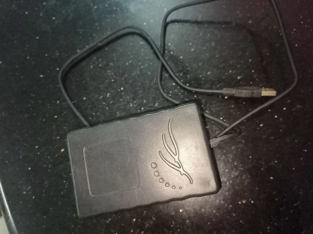 The reader in its enclosure